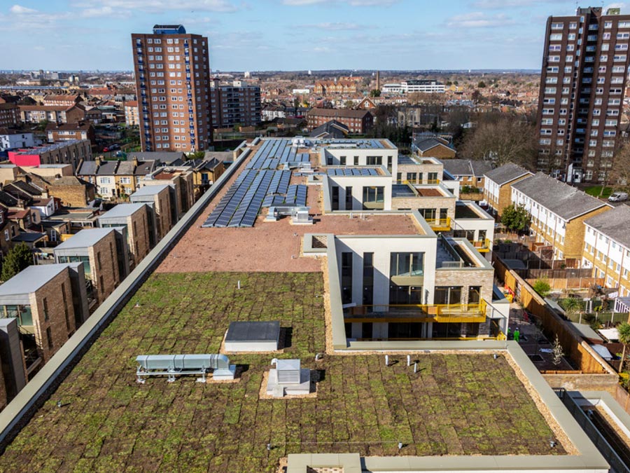 blue roof on The Forge housing development in East London